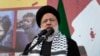 Presiden Iran Ebrahim Raisi berbicara dalam aksi demo anti-Israel di alun-alun Revolusi Islam di Teheran, Iran, pada 18, Oktober 2023. (Foto: AP/Vahid Salemi)