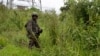 FILE - An M23 rebel looks on in Kibumba in eastern Democratic Republic of the Congo, Dec. 23, 2022. 