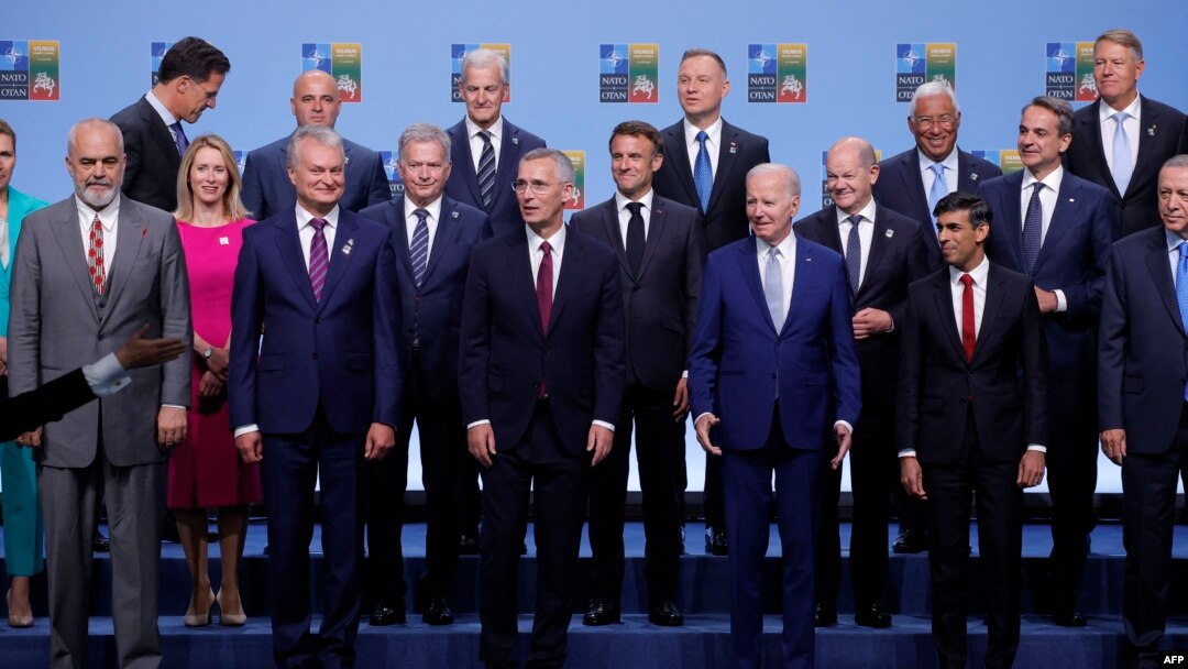Lithuania's President Gitanas Nauseda, NATO Secretary-General Stoltenberg, US President Joe Biden, Britain's PM Sunak and Turkey's President Recep Tayyip Erdogan pose with other participants for a family photo at NATO Summit in Vilnius, July 11, 2023.