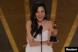 Michelle Yeoh wins the Oscar for Best Actress for "Everything Everywhere All at Once" during the Oscars show at the 95th Academy Awards in Hollywood, Los Angeles, California, U.S., March 12, 2023.