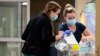 Nurses care for newborns at a hospital in Burlington, Vermont, April 28, 2023. Research found that babies born to opioid users had shorter hospital stays when their care emphasized parent involvement. (Ryan Mercer/University of Vermont Health Network via AP)