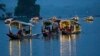 Delegates from the Group of 20 nations attending a tourism meeting enjoy boat ride at the Dal Lake in Srinagar, Indian controlled Kashmir, May 22, 2023. 