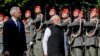 Indian Prime Minister Narendra Modi, right, is welcomed with military honors by Austria's Chancellor Karl Nehammer in Vienna, July 10, 2024.
