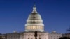 Gedung Capitol AS tampak sebelum matahari terbit di Capitol Hill, Washington, pada Senin, 21 Maret 2022. (Foto: AP)