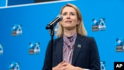 FILE - Estonia's Prime Minister Kaja Kallas speaks during her arrival at the NATO summit in Washington, July 11, 2024.