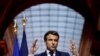 France's President Emmanuel Macron holds a press conference following an EU leaders summit to discuss the fallout of Russia's invasion in Ukraine, at the Palace of Versailles, near Paris, on March 11, 2022.