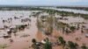 FILE - This video grab taken from handout aerial video footage by UNICEF Jan. 24, 2021, shows widespread flooding in the Buzi area of Mozambique after the landfall of Cyclone Eloise. (AFP PHOTO/UNICEF/Bruno Pedro)