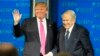 On Feb. 24, 2016, Republican presidential candidate, Donald Trump, accompanied by Rev. Pat Robertson, waves as he arrives for an appearance at Regent University in Virginia Beach, Virginia.