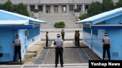 2019년 동료 선원 16명을 살해한 혐의를 받은 북한 주민 2명이 북한으로 송환된 판문점 모습
