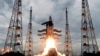 FILE - This photo released by the Indian Space Research Organization shows its Geosynchronous Satellite Launch Vehicle MkIII, carrying Chandrayaan-2, lift off from Satish Dhawan Space center in Sriharikota, India, July 22, 2019. 