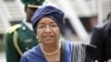Liberia's President Ellen Johnson Sirleaf arrives for a meeting of the Economic Community of West African States (ECOWAS) in Nigeria's capital Abuja, February 16, 2012.