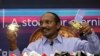 Indian Space Research Organization (ISRO) Chairman Kailasavadivoo Sivan displays a model of Chanrayaan 2 orbiter and rover during a press conference at their headquarters in Bangalore, India, Aug. 20, 2019.