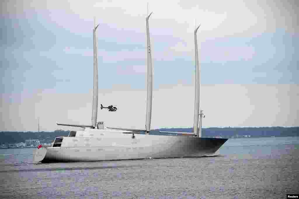 The 142.81-meter sail-assisted motor yacht 'Sailing Yacht A' passes Elsinore, North Sealand, Denmark. With masts of 90 meters, a huge swimming pool and eight stories 'Sailing Yacht A' is the world's largest sailing ship. The yacht, owned by Russian tycoon Andrey Melnichenko, was build in Kiel, Germany, and is now passing through Denmark on its way to Kristiansand in Norway. 