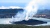 This Sunday, Oct. 1, 2017 photo provided by GeoHazards Divison, Vanuatu Meteorological and GeoHazards Department, shows an aerial view of the volcanic cone that has formed in Lake Vui near the summit of Ambae Island, Vanuatu.