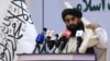 FILE - Taliban chief spokesman Zabihullah Mujahid speaks during an event in Kabul, Afghanistan, Nov. 25, 2021. 