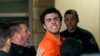 Suspect Luigi Mangione is taken into the Blair County Courthouse in Hollidaysburg, Pennsylvania, Dec. 10, 2024. (Benjamin B. Braun/Pittsburgh Post-Gazette via AP)