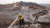 California's Malibu remains under threat of flames, thousands evacuated