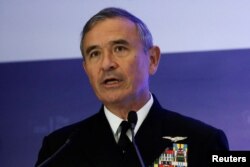 FILE - U.S. Navy Admiral Harry Harris Jr, head of the Pacific Command, speaks at a Fullerton Lecture on 'Challenges, Opportunities and Innovation in the Indo-Asia-Pacific,' in Singapore, Oct. 17, 2017.
