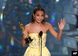 Alicia Vikander accepts the award for best actress in a supporting role for “The Danish Girl” at the Oscars on Feb. 28, 2016, at the Dolby Theatre in Los Angeles.