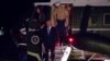 President Donald Trump salutes as he steps off of Marine One on this return to the White House in Washington, Sunday, Aug. 20, 2017.