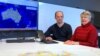 University of Newcastle research academic, Professor Lyndall Ryan, right, and researcher Bill Pascoe sit in front of a screen, July 18, 2018, displaying a map detailing the number of Aboriginal and Torres Strait Islander massacres that occurred on Australia’s colonial frontier.
