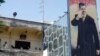 FILE - Syrian detainees, who were arrested for participating in protests against Syrian President Bashar al-Assad's regime, are seen at a detention facility in Damascus.
