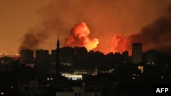 Požar u Gaza Sitiju posle izraelskog vazdušnog napada 12. oktobra 2023. (Foto: Mahmud Hams/AFP)
