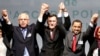 L-R, Mohammed Chouaib, head of delegation from the U.N.-recognized government in the eastern city of Tobruk, Libya, Fayez Sarraj, Libyan prime minister, and Dr. Saleh Almkhozom, second deputy chairman of the Libyan General National Congress, react after signing a U.N.-sponsored deal aiming to end Libya's conflict, Dec.17, 2015 in Sikhrat, Morocco. 