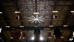FILE - Members of the military attend a ceremony at Andrews Air Force Base, Md., Dec. 20, 2019. Suicides in the active-duty Air Force surged last year to the highest in at least three decades, even as other services's numbers stabilized or declined.