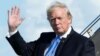 U.S. President Donald Trump waves as he arrives at Newark International airport in Newark, N.J., to spend a weekend at Trump National Golf Club in Bedminister, June 9, 2017. 