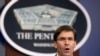FILE - U.S. Secretary of Defense Mark Esper speaks to reporters during a briefing at the Pentagon, outside Washington, Aug. 28, 2019.