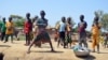 FILE - Children are seen posing in Blaram in northern Cameroon on March 1, 2013.