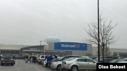 Shoppers walk in the parking lot of a Walmart store in Fairfax, Virginia. (Photo: Diaa Bekheet) Walmart says it will stop selling ammunition for handguns and assault-style weapons.