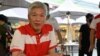 FILE - Lee Hsien Yang, the brother of Singapore's then-prime minister Lee Hsien Loong and son of the city state's founding father Lee Kuan Yew is shown during an event at the Tiong Bahru Market in Singapore on June 24, 2020