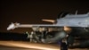 FILE - This photo released on Tuesday, Nov. 17, 2015 by the French Army Communications Audiovisual office (ECPAD) shows a French Rafale jet on the tarmac of an undisclosed air base as part of France's Operation Chammal launched in Sept. 2015 in support of the US-led coalition against the Islamic State group.
