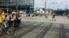 Outside the main train station in Dresden, Germany, refugees say with the long and opaque wait for documentation, they often have little to do but to wait, July 8, 2016. (H. Murdock/VOA)