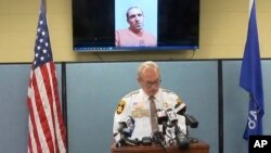 FILE - In this image provided by Green Lake County Sheriff's Office, Sheriff Mark Podoll holds a news conference on Nov. 21, 2024, in Green Lake, Wisconsin, regarding Ryan Borgwardt, who faked his own drowning this summer.