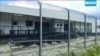 In this file photo made from Australia Broadcasting Corporation video taken shows housing of asylum seekers protesting the possible closure of their detention center, on Manus Island, Papua New Guinea, Oct. 31, 2017.