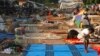 Displaced refugees are seen in a camp at Mpoko international airport in Bangui, Central African Republic, Dec. 15, 2013.