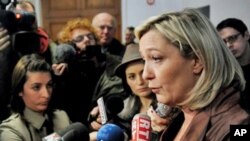 French presidential candidate, Marine Le Pen (R), president of the extreme right political party, leads the first round of public polls with 23 percent of the vote in Lille, northern France, March 5, 2011