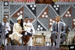 Britain's Prince Harry and Meghan, Duchess of Sussex at the official welcome ceremony in Suva, Fiji, Oct. 23, 2018.
