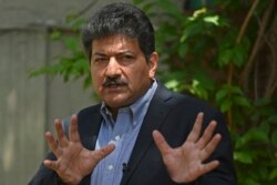 حامد میر پاکستان میں صحافیوں پر نامعلوم افراد کی جانب سے تشدد کے خلاف احتجاج کر رہے ہیں۔ 26 مئی 2021