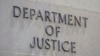 FILE - The outside of the Department of Justice building in Washington. The justice department says Mohammad Sharifullah has been charged with 'providing and conspiring to provide material support and resources to a designated foreign terrorist organization resulting in death.'