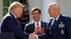 U.S. President Donald Trump stands behind a U.S. Space Command flag with Vice President Mike Pence at an event to launch the United States Space Command in Washington, Aug. 29, 2019.