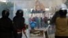 Protesters clash with security forces in the central town of Kasserine, Tunisia, Jan. 21, 2016.