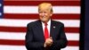U.S. President Donald Trump takes the stage for a rally at the U.S. Cellular Center in Cedar Rapids, Iowa, June 21, 2017. 