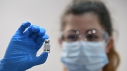 VOA Asia - A vaccine will not immediately end the pandemic