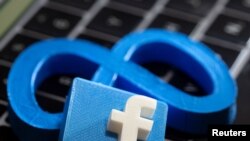 Ілюстрація: Логотип Facebook та Мета 