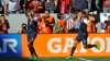 United States forward Chris Wondolowski (l) celebrates his goal with teammate Brad Davis during the first half of a friendly soccer match against South Korea in Carson, California, Feb. 1, 2014.