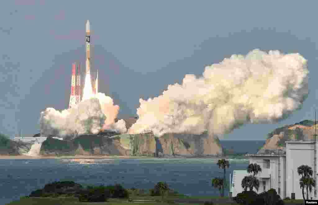 A H-2A rocket carrying Japan Meteorological Agency's new weather satellite "Himawari-9" is launched at Tanegashima Space Center on the Japanese southwestern island of Tanegashima, Kagoshima Prefecture, in this photo taken by Kyodo.